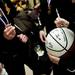 Manchester players sign an autograph basketball in the locker room after the game on Saturday, March 16. Daniel Brenner I AnnArbor.com